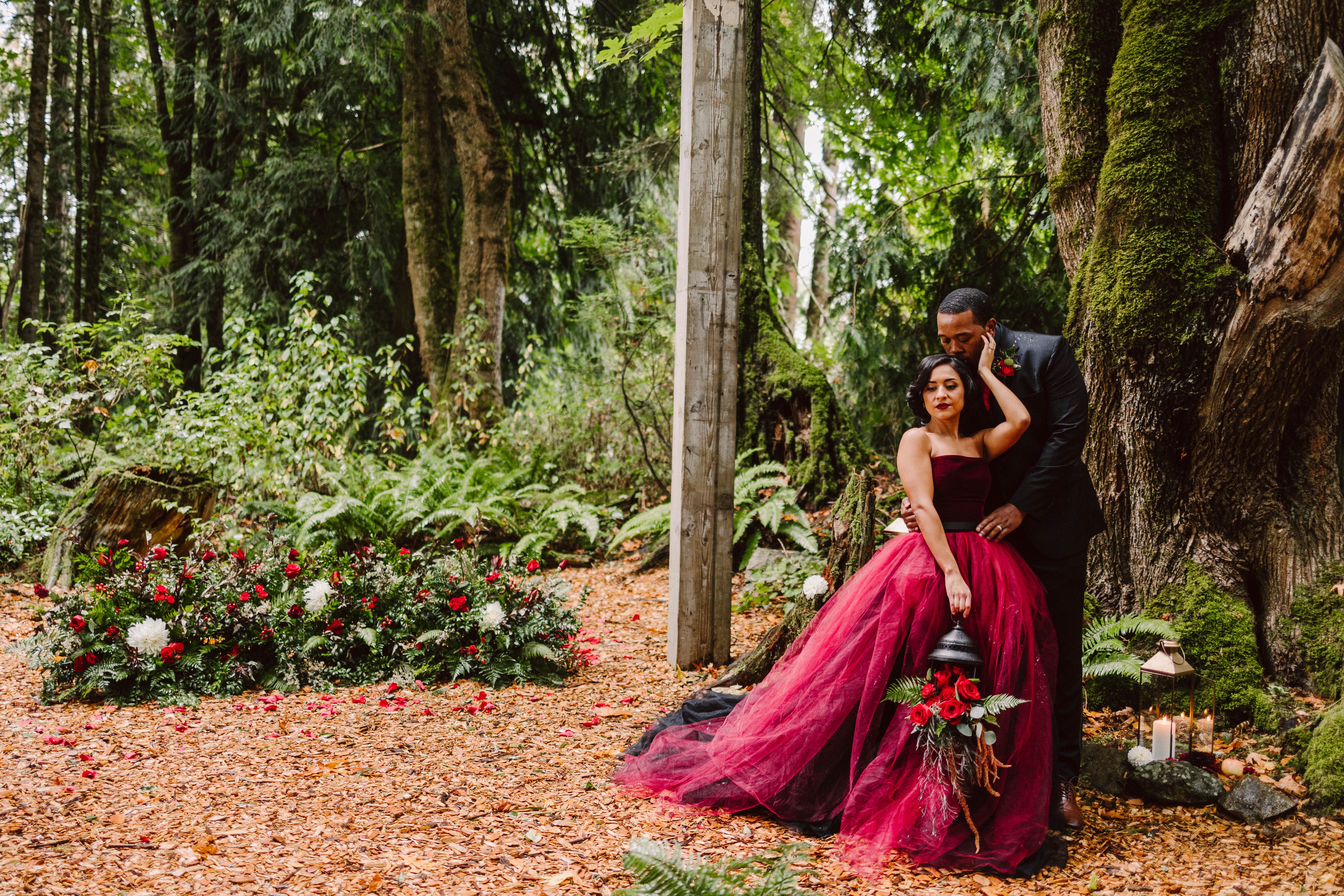 Pollen In Love wedding couple surrounded by forest florals